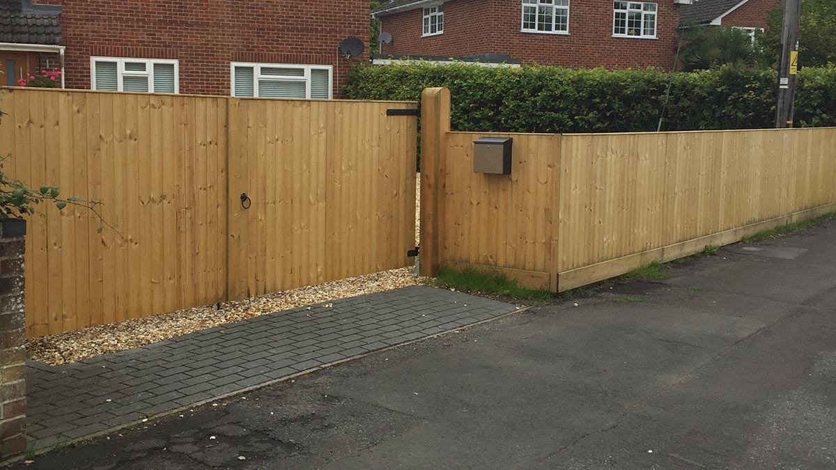 Softwood entrance gates and matching fencing in tongue and groove, Kingsworthy