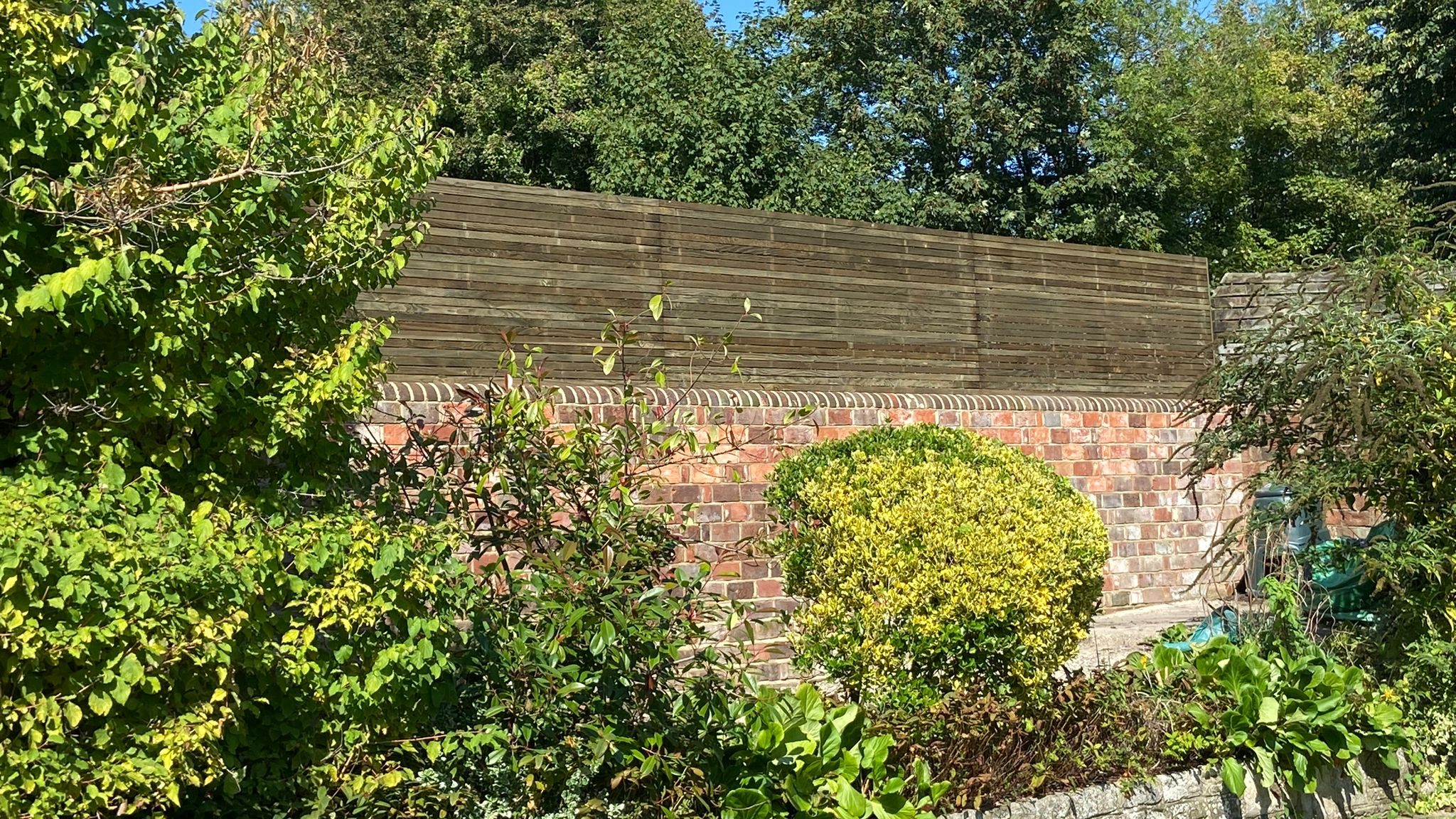 1200mm contemporary fencing atop new brick garden wall 1200mm contemporary fencing atop new brick garden wall in Winchester