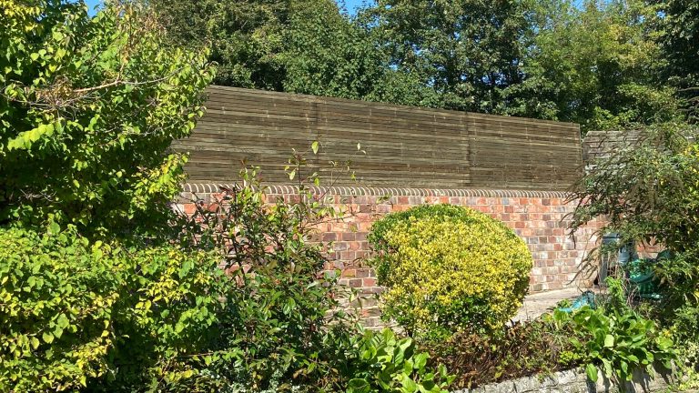 1200mm contemporary fencing atop new brick garden wall 1200mm contemporary fencing atop new brick garden wall in Winchester