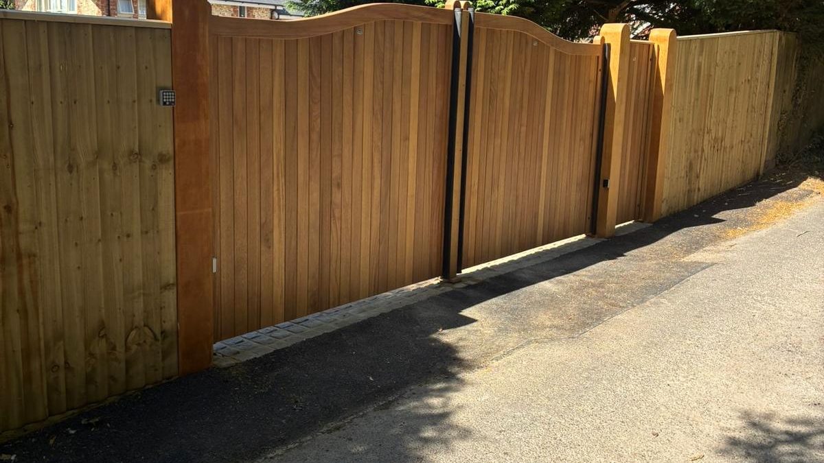 front left view of automated electric wooden driveway gate installation in Ashurst including pedestrian gate