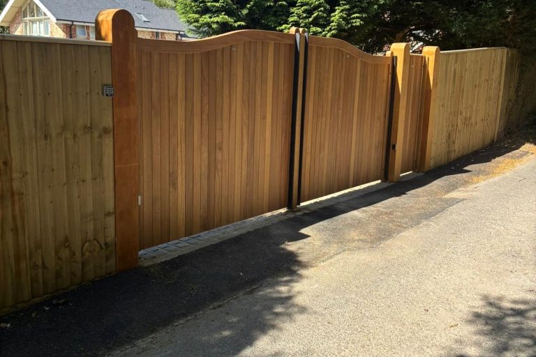 front left view of automated electric wooden driveway gate installation in Ashurst including pedestrian gate