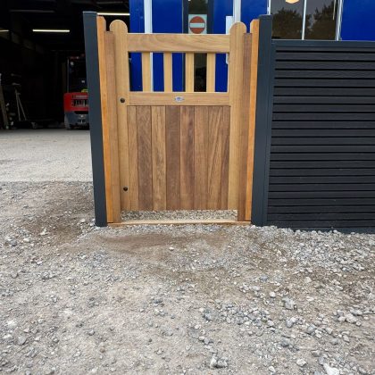 Composite fencing example with hardwood gate