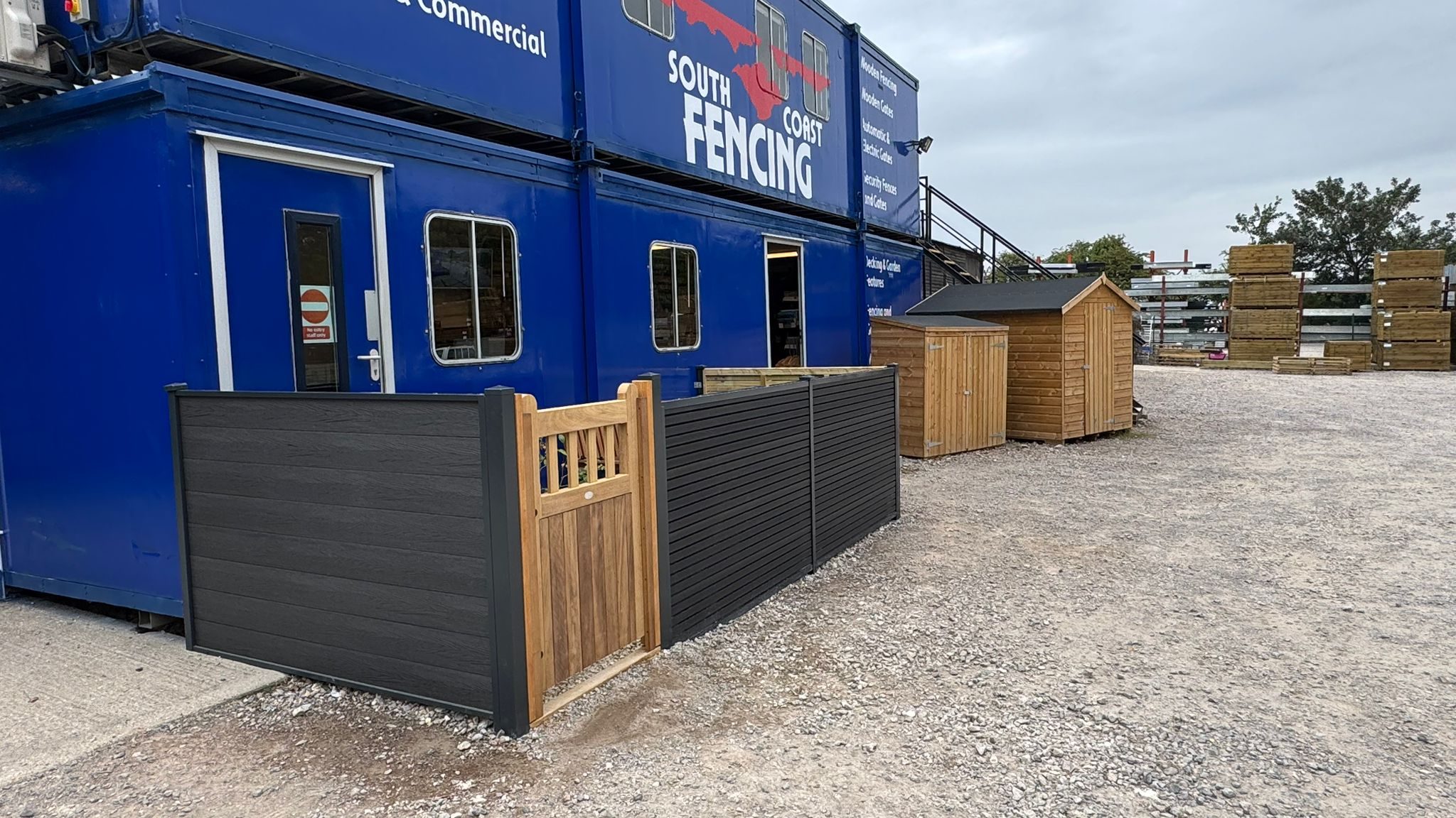 Composite fencing example showing 2 board styles with gate composite fencing example